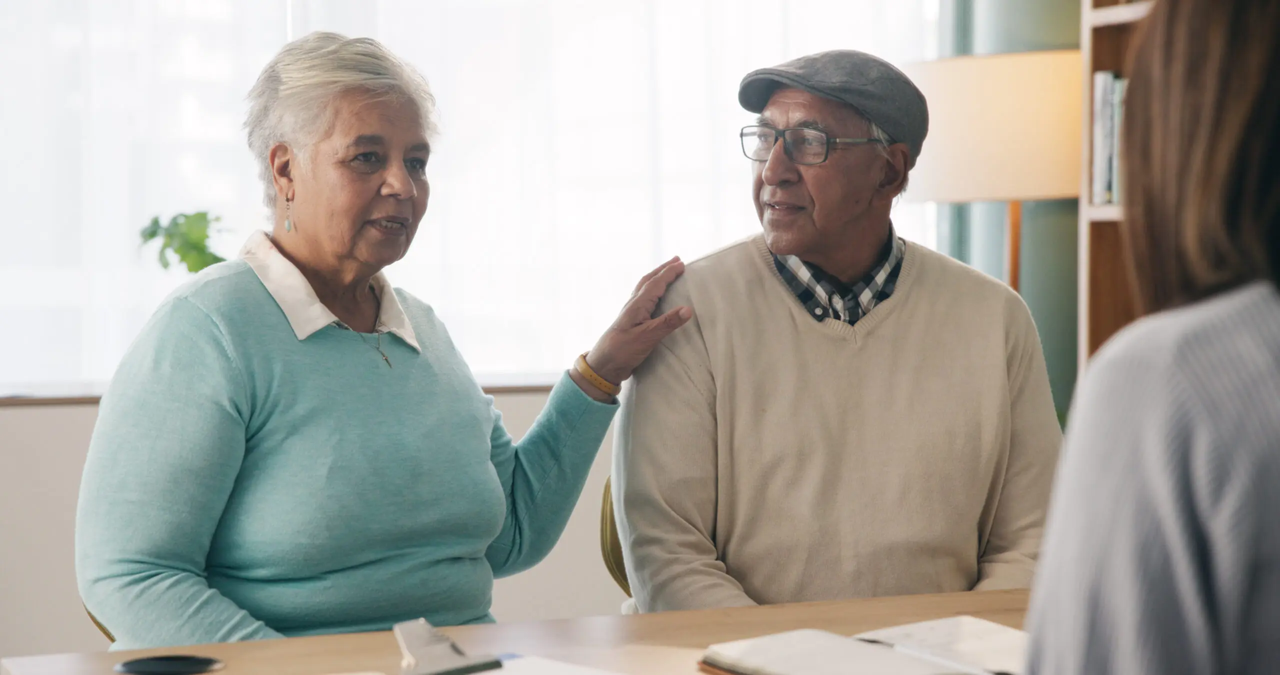 Office, discussion or old couple with consultant for appointment, will planning or beneficiary update. Support, insurance agent or senior people with power of attorney contract, policy help or advice.